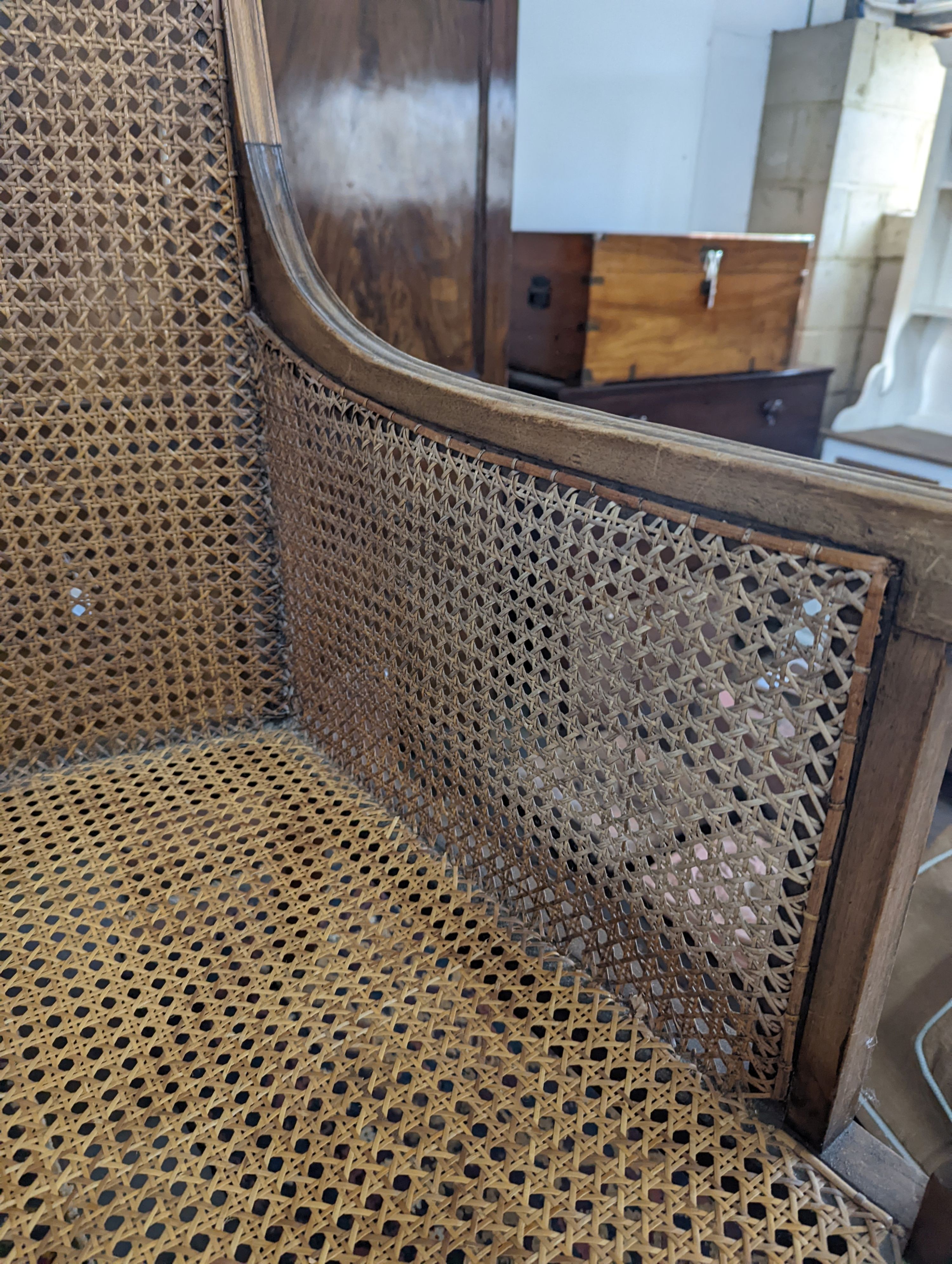 A Regency style mahogany bergere armchair, width 59cm, depth 56cm, height 97cm